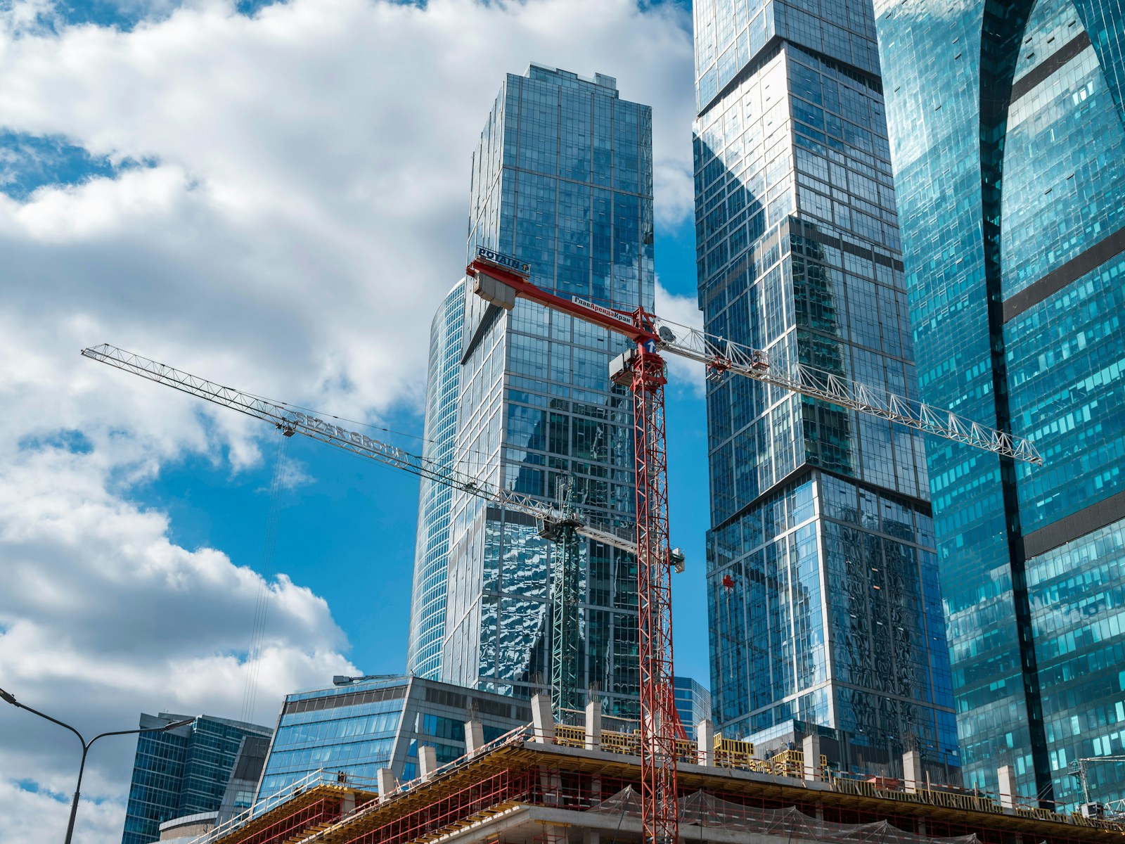 High-rise construction site with cranes and active development work